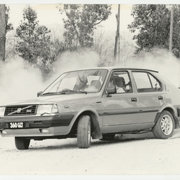 Photographs relating to Messenger Press : cars