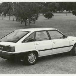 Photographs relating to Messenger Press : cars