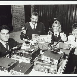 These Hindmarsh police proudly display the $10,000 haul of stolen radio equipment which they discovered in a car earlier this month. The discovery led to the arrest of five men over the stolen gear. 31st May 1989. 