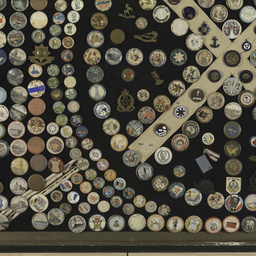 Framed collection of World War I badges