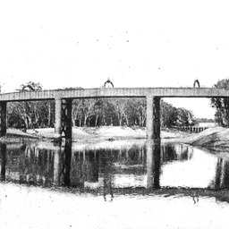 The railway bridge at Echuca with wharf in distance