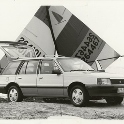 Photographs relating to Messenger Press : cars