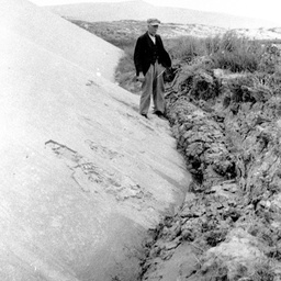George Ross standing on edge of sand drift at Younghusband Peninsula